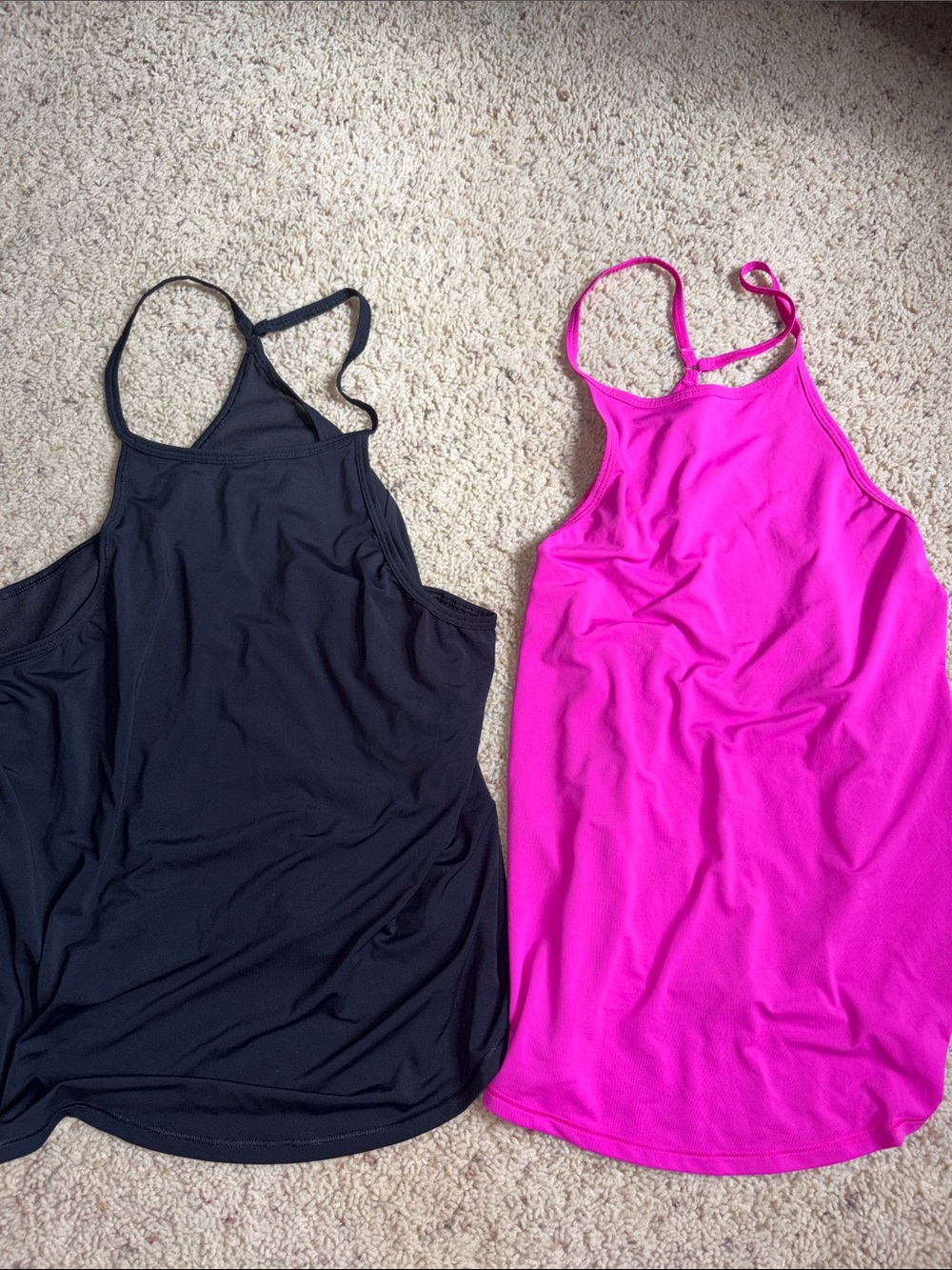 Black and pink racer back tanks